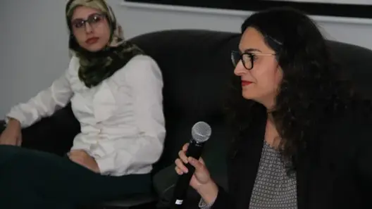 Two women at the conference