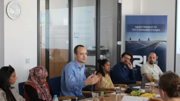 The on-going workshop and the organizing members, Philipp Blechinger and Djamel Djenouri