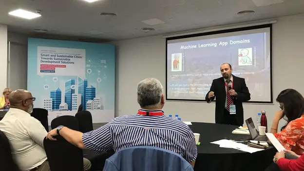 AGYA member Djamel Djenouri holding a presentation