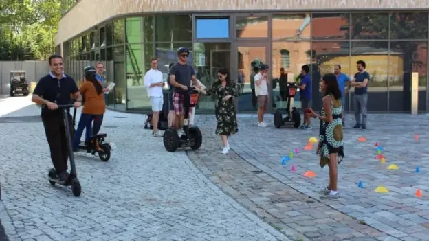 The on-going workshop, trying out new means of transportation