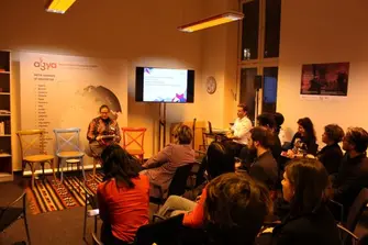 Principal Investigator Verena Lepper holding a presentation in front of an audience