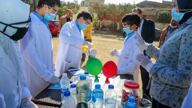 Work outside the AGYA Portable STEM Lab Car