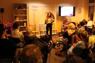 Femal slammer performs poetry