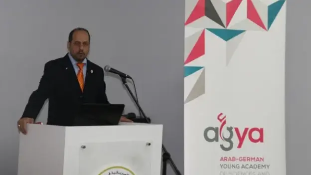 An attendand is giving a speech.