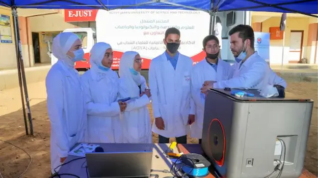 Group outside of the AGYA Portable STEM Lab Car